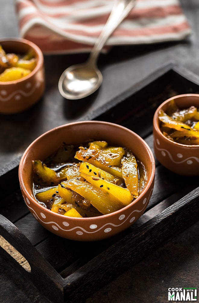 aam ki launji in a traditional clay bowl