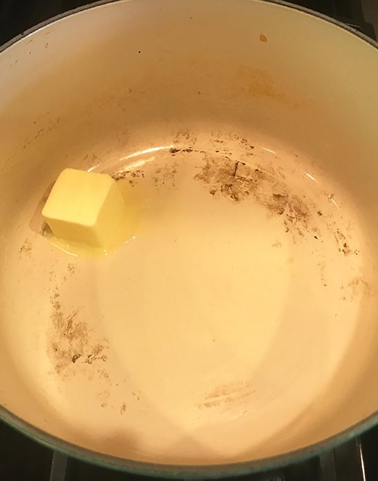 pat of butter melting in a pot