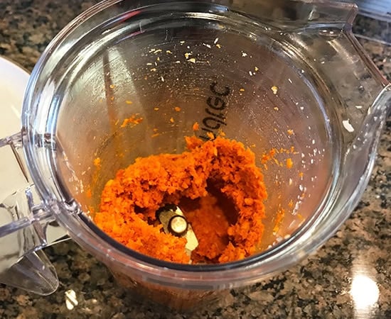 red color chutney in a blender