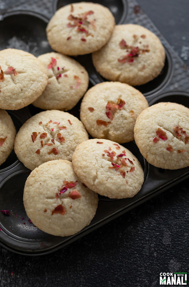 cookies arranged on top of a muffin tray