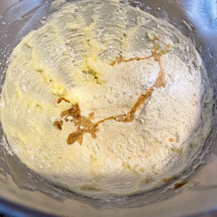 flour, vanilla, sugar added to creamed butter