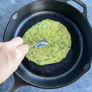 oil being applied to a paratha