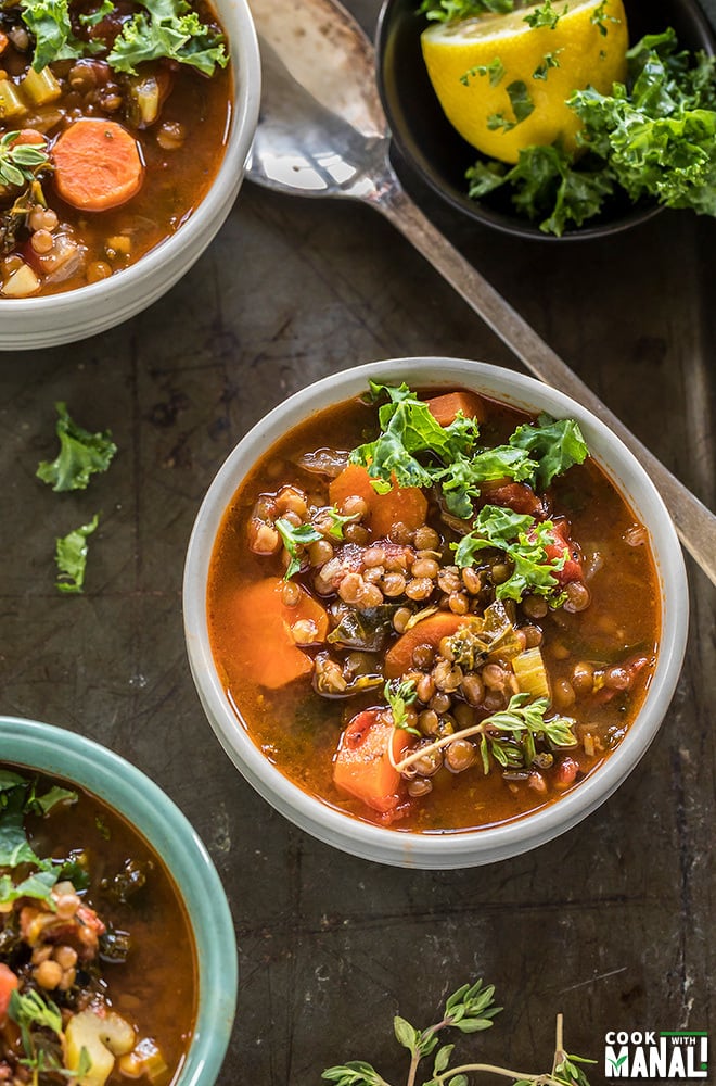 overhead shot of bowls of vegan lentil soup