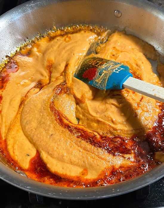 onion tomato masala in a pan