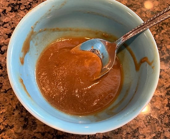 tamarind pulp in a blue color bowl