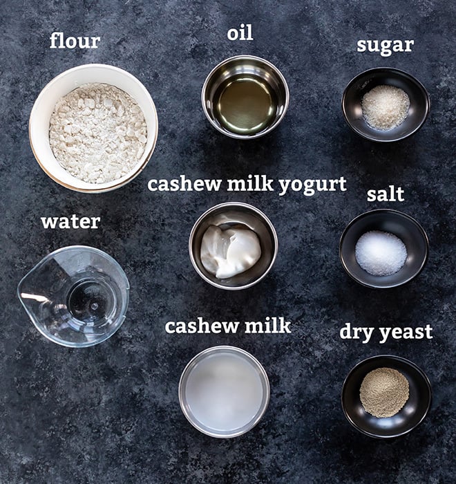 ingredient bowls for naan placed on a board