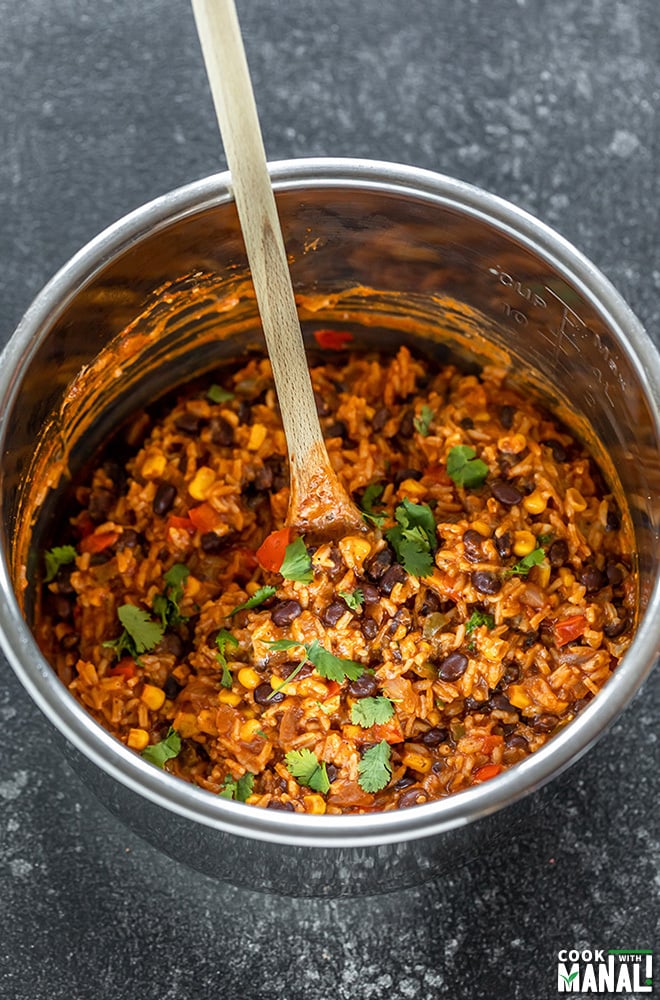 enchilada rice in an instant pot with a spatula